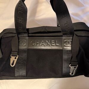 CHANEL Black Canvas Duffel with Logo Strap Detailing